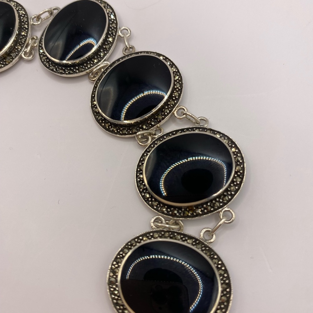 Elegant 925 Sterling silver, Black Onyx with sparkling marcasites.